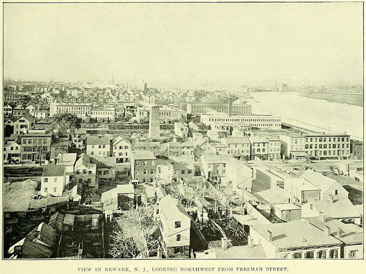 Oxford Street
This photo was taken around 1897 and most likely from the roof of Feigenspan's Brewery on Freeman Street.  The view is to the west northwest.  The large chimney in the center of the photo is from the P. Reilly & Sons Tannery which was located between Providence & Lexington Streets.  The factory area extended from the Morris Canal south almost to Bowery Street (Fleming Avenue) which would be the middle of the photograph, left to right. The first street from the bottom running L to R is Oxford Street.

Photo from Essex County Illustrated 1897
