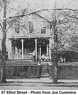 57 Elliot Street
57 Elliott Street about 1930 (that's Joe Cummins in the middle of the 3 kids on the steps of the porch).  The house is 2 doors down from Elliott St school, and the school playground is right in back of our yard. House was built about 1850
