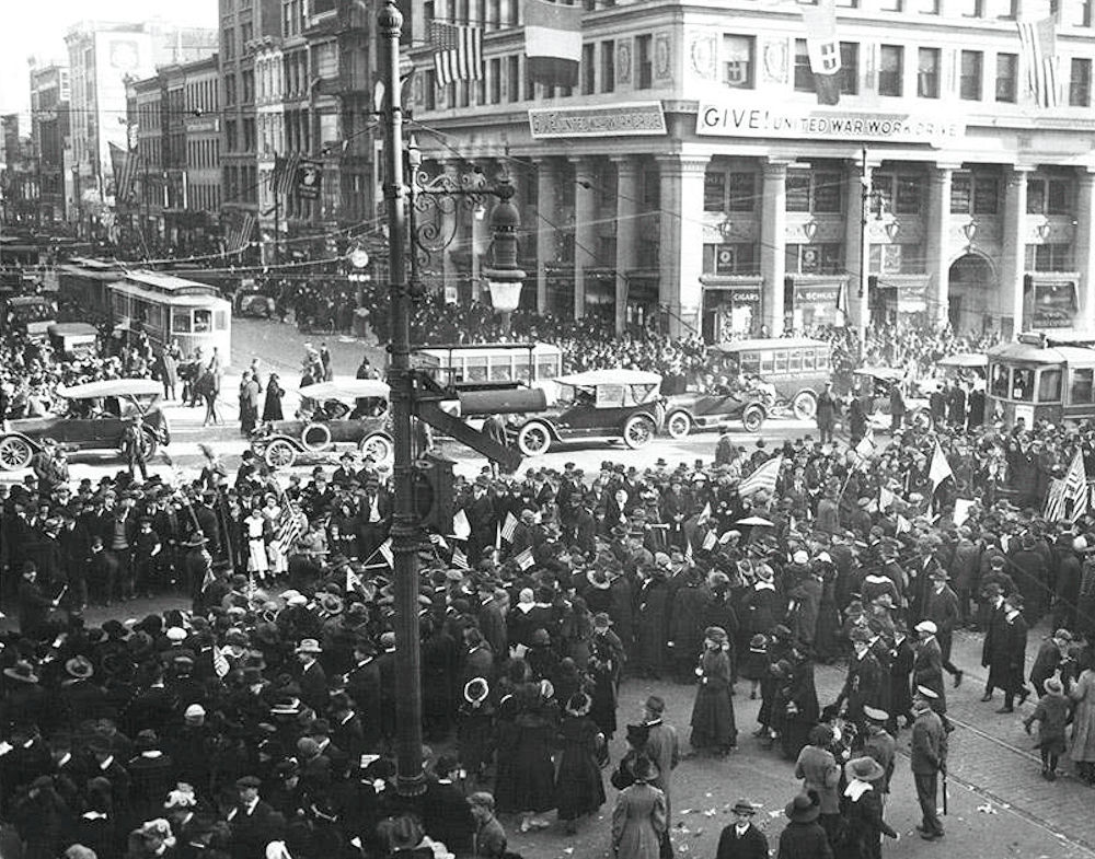 The crowded Armistice Day celebration in the busy Four Corners section of Newark, November 11, 1918.
Photo from the Influenza Encyclopedia
